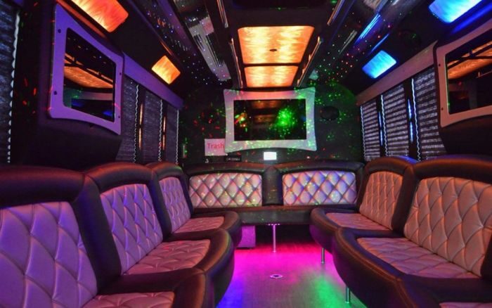 Party bus lounge with LED ceiling – Mead limo service